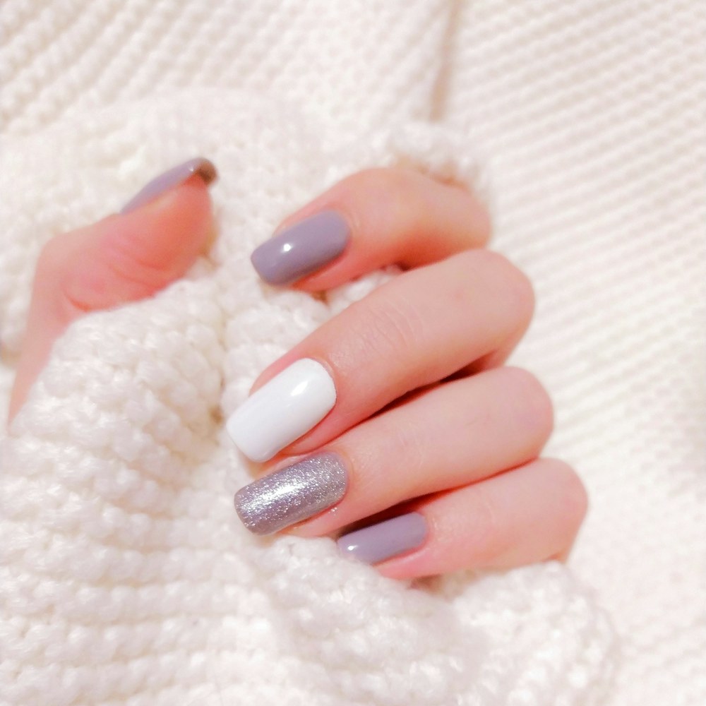 Gel and dip powder nail enhancements with subtle glitter accent